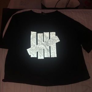 Reflective undefeated shirt